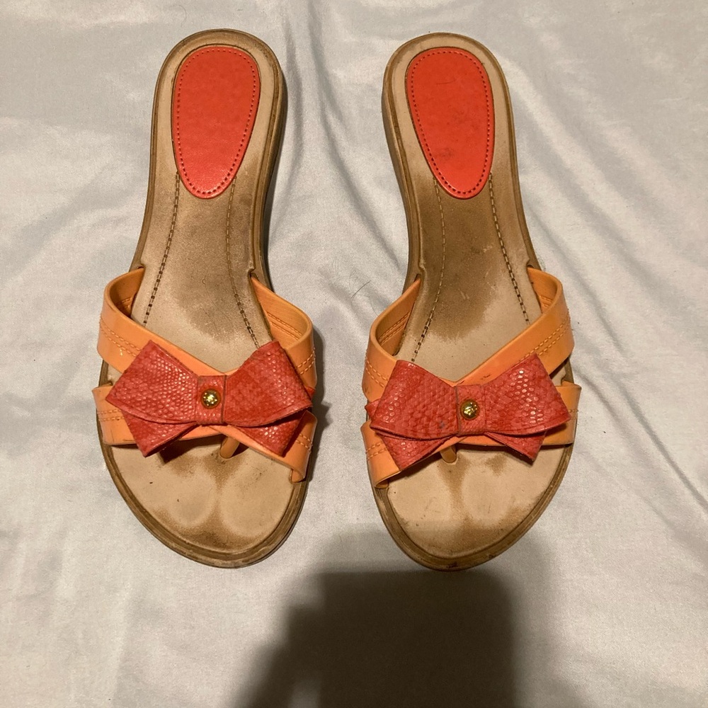 Vibrant Orange and Red Slide Sandals with Bow Detail